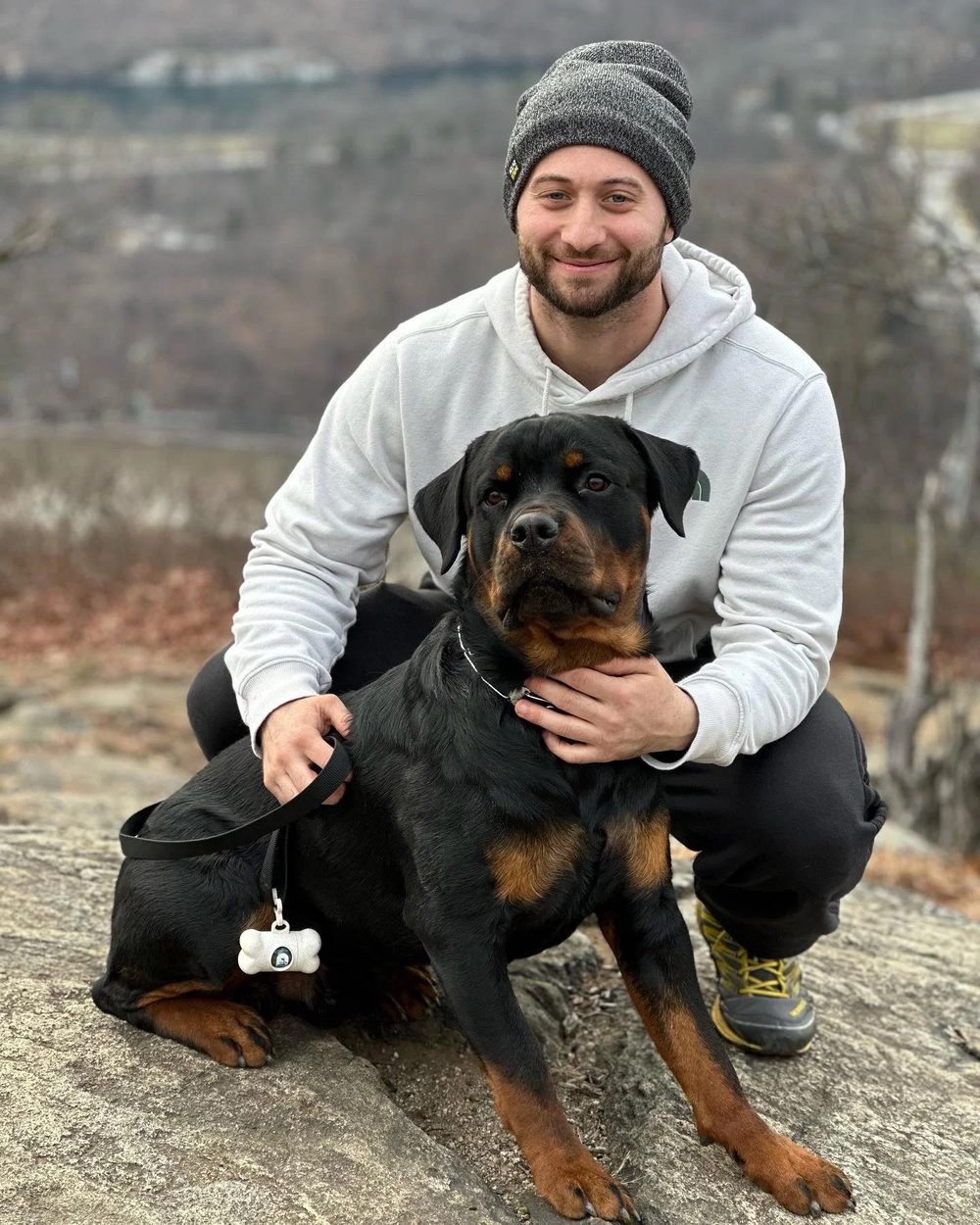 Owner of Girvalo's Home Service with his dog